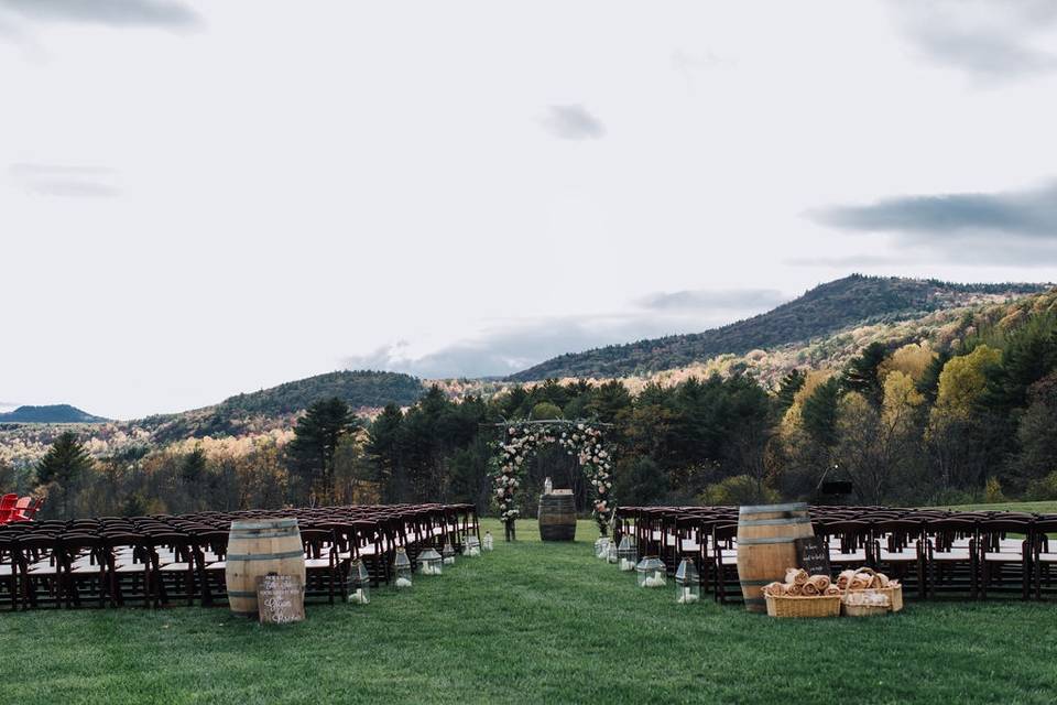 Outdoor wedding ceremony at the barn at lord howe valley in lake george